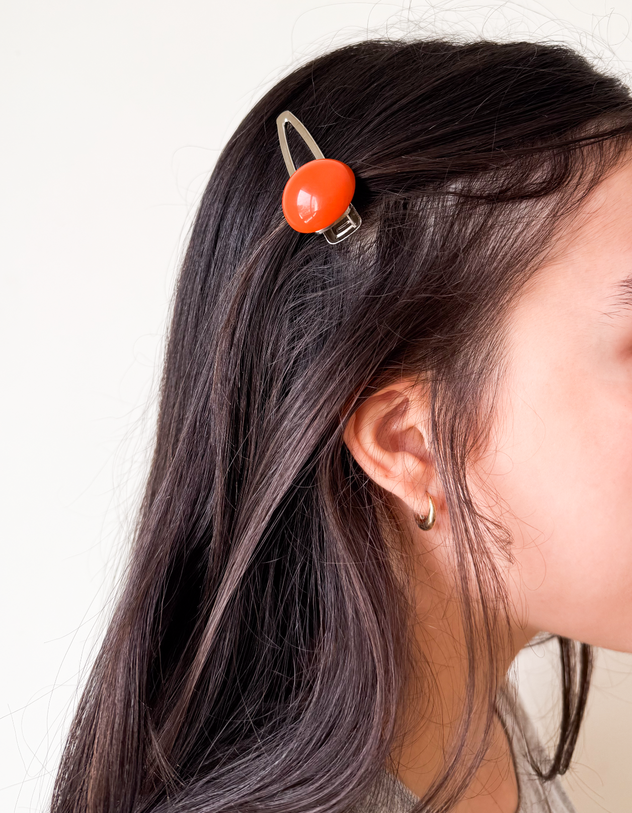 Presilha de cabelo vazada chiclete laranja