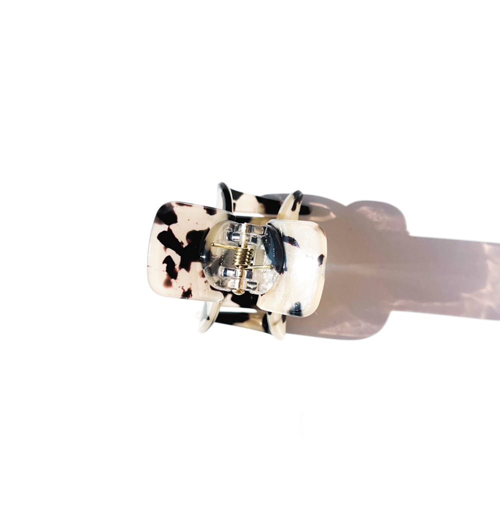 Piranha de cabelo marmorizada creme e preto