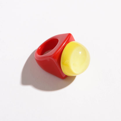 Anel bola vermelho