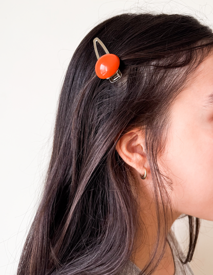 Presilha de cabelo vazada chiclete laranja