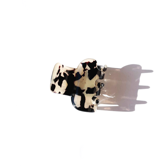 Piranha de cabelo marmorizada creme e preto