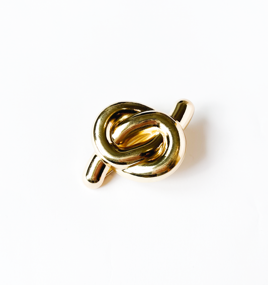 Presilha de cabelo nó metal dourado